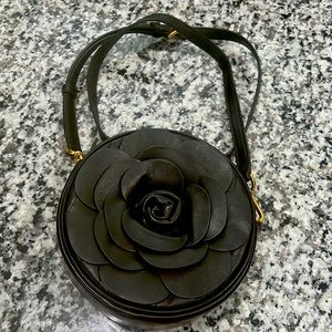 Gorgeous Michael Kors leather crossbody with leather flower on the front